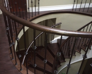Hardwood Flooring installation-metal spindles-hardwood-custom make nosing-solid oak newel post-Curved nosing installation in Pickering