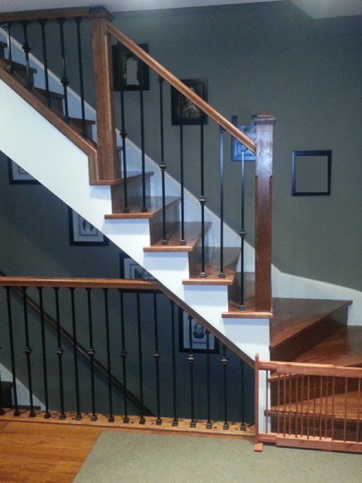 refacing-winder-stair-capping-new-railing-with-metal-spindles-oak-nosing-solid-oak-posts-white-stringers-installed-in-brampton
