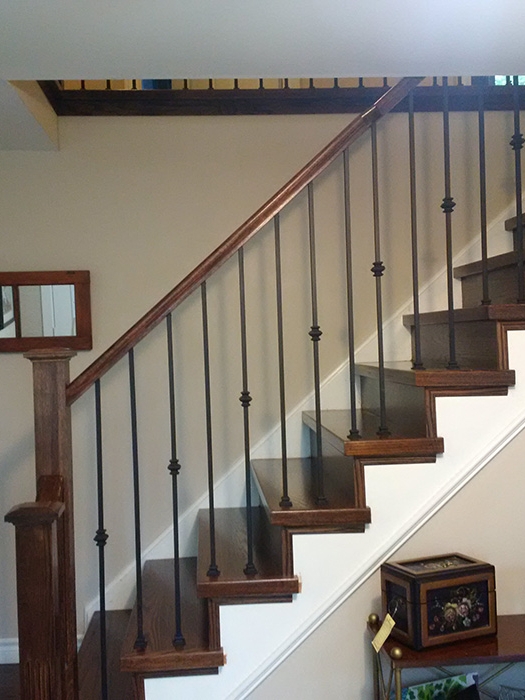 straight-stairs-capping-metal-spindles-installed-in-king-city